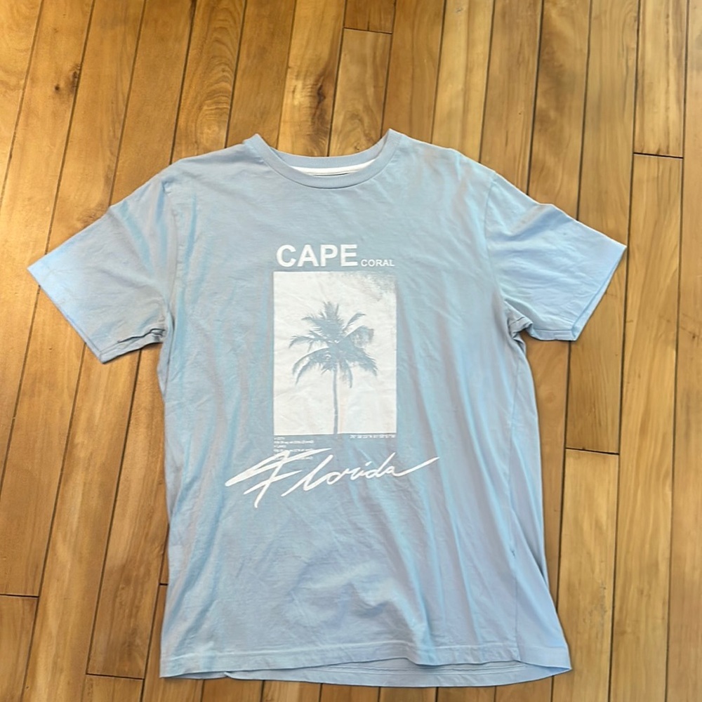 A Cape Coral light blue short sleeve men t shirt